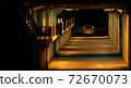 A tunnel where orange and blue shine brightly 72670073