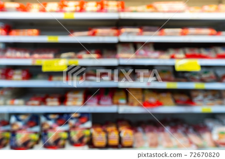 Blur image of shelf with consumer product shop in supermarket Blur image of shelf with consumer product shop in supermarket 72670820