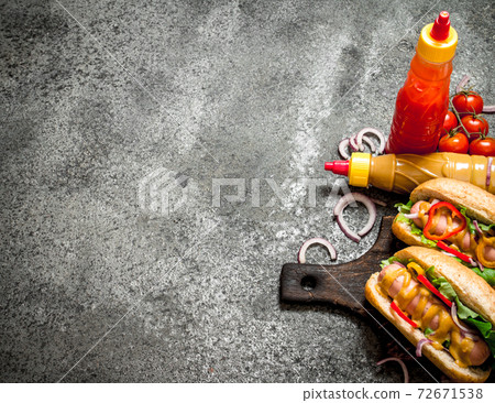 Street food. Hot dogs with vegetables and herbs. Street food. Hot dogs with vegetables and herbs. 72671538