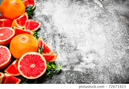 Fresh grapefruits. 72671923