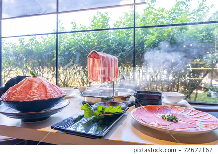 Delicious beef slice in the delicious hotpot 72672162