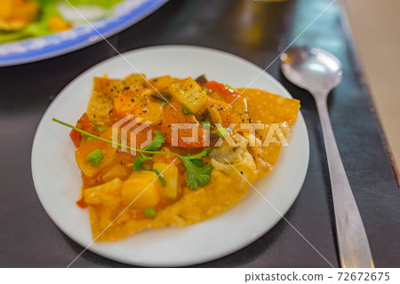 Vietnamese vegetable pizza- famous dish in Hoi An Vietnamese vegetable pizza- famous dish in Hoi An 72672675