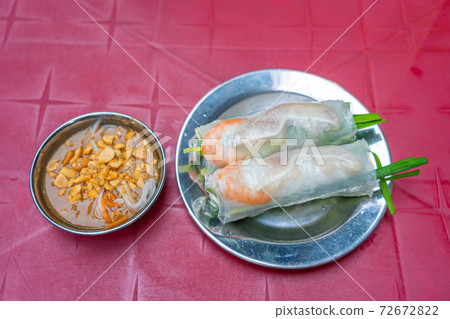 Vietnamese classic fresh spring rolls served with peanut sauce Vietnamese classic fresh spring rolls served with peanut sauce 72672822