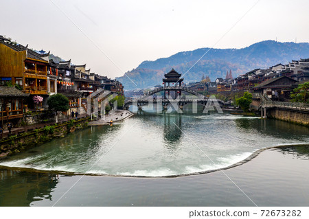 Wide view of beautiful Fenghuang ancient town in China Wide view of beautiful Fenghuang ancient town in China 72673282
