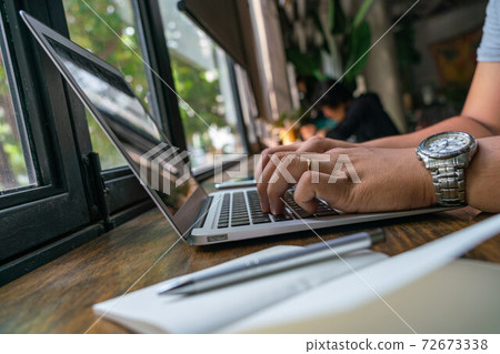 Married man hands typing on laptop keyboard Married man hands typing on laptop keyboard 72673338