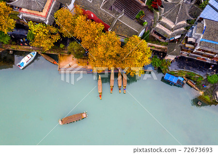 Beautiful aerial view of Fenghuang ancient town on Tuojiang river Beautiful aerial view of Fenghuang ancient town on Tuojiang river 72673693