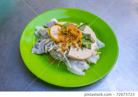 Plate of fresh cooked Vietnamese steamed rice rolls- Banh Cuon Plate of fresh cooked Vietnamese steamed rice rolls- Banh Cuon 72673723