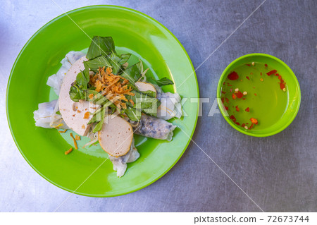 Top view photo of Vietnamese steamed rice rolls- Banh Cuon Top view photo of Vietnamese steamed rice rolls- Banh Cuon 72673744