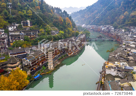 Peaceful morning in Fenghuang ancient town along TuoJiang river Peaceful morning in Fenghuang ancient town along TuoJiang river 72673846