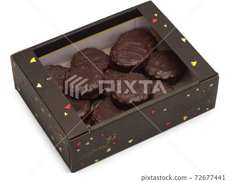 Sandy chocolate cookies in the box isolated on the white 72677441