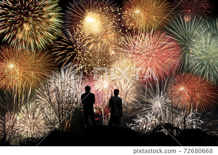 Friend  standing on the hill and watching the fireworks 72680668