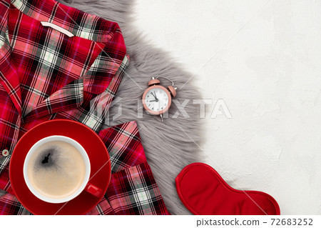 Womens sleapwear and accessories on gray fluffy bedspread Womens sleapwear and accessories on gray fluffy bedspread 72683252