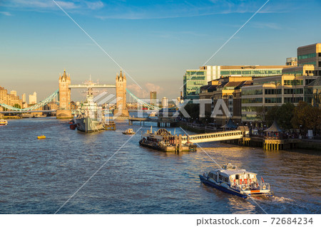 Tower Bridge and HMS Belfast warship in London 72684234
