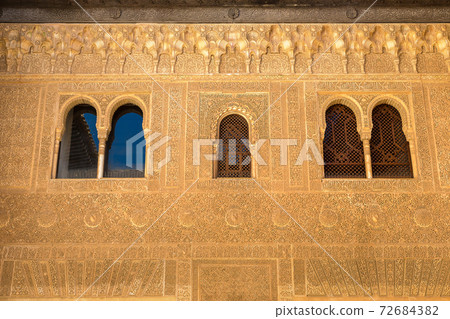 Decorated facade in Alhambra palace Decorated facade in Alhambra palace 72684382