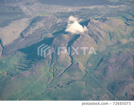 snowy tops of volcanic mountains on the south west of Iceland on sunny day 72685073