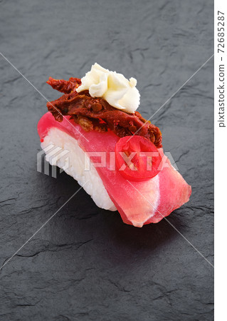 Sushi with tuna, dried tomato and cream cheese Sushi with tuna, dried tomato and cream cheese 72685287