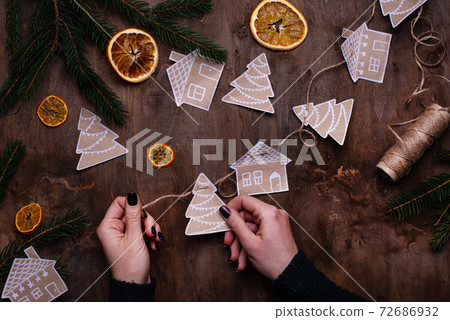 Paper craft Christmas tree garland 72686932