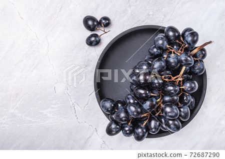Fresh Dark blue purple grape isolated on white background. Fresh Dark blue purple grape isolated on white background. 72687290