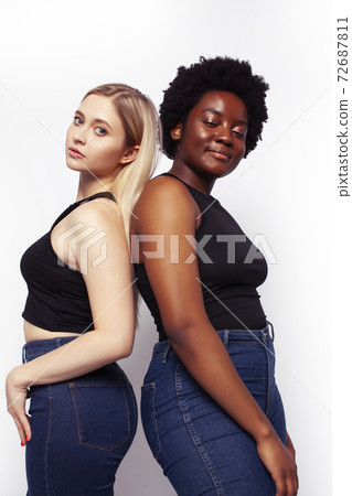 teenage friends cheerful having fun, happy smiling, cute posing isolated on white background, lifestyle people concept, african-american and caucasian 72687811