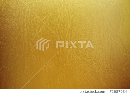Golden texture of foil, metal sheet, wrapping paper. 72687984