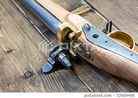 flintlock mechanism bolt, breech-loading pistol close up 72689498