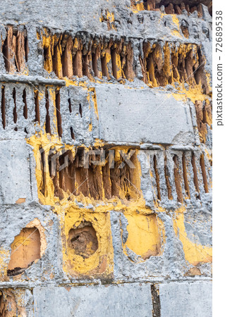 texture of an industrial old factory wall with destroyed and damaged bricks texture of an industrial old factory wall with destroyed and damaged bricks 72689538