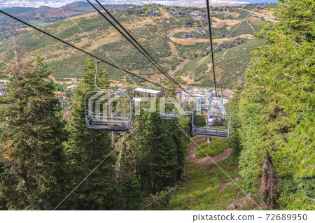 Scenic landscape during summer of a ski resort in Park City Utah with chairlifts 72689950