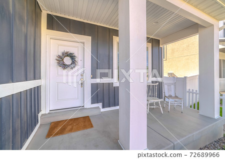 Front door and porch area of modern suburban home Front door and porch area of modern suburban home 72689966