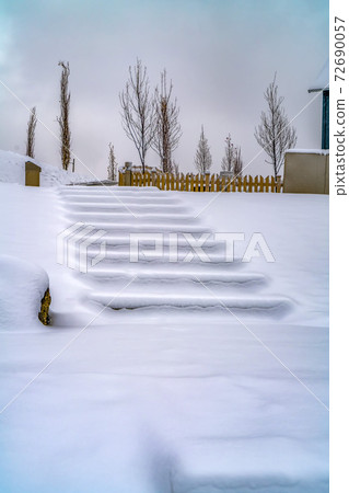 Steps on snowy landscape in Daybreak Utah Steps on snowy landscape in Daybreak Utah 72690057