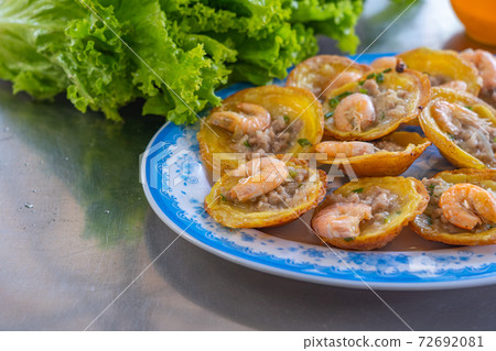 Banh Khot- Vietnamese tiny shrimp pancake served with vegetables Banh Khot- Vietnamese tiny shrimp pancake served with vegetables 72692081
