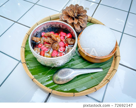 Tubtim Krob in Thai language, Thai dessert Water Chestnuts in Coconut Milk and ice Tubtim Krob in Thai language, Thai dessert Water Chestnuts in Coconut Milk and ice 72692147