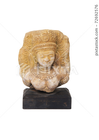 Small apsara statue on a wooden base for home decoration. Small apsara statue on a wooden base for home decoration. 72692576