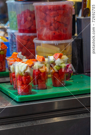 Mixed fruit cups for sale at dessert store in market 72692785