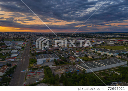 Aerial cityscape of Dijon city under summer sunset nightfall sky 72693021