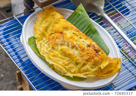 Vietnamese crusty yellow shrimp crepe on the plate- Banh Xeo Vietnamese crusty yellow shrimp crepe on the plate- Banh Xeo 72693317