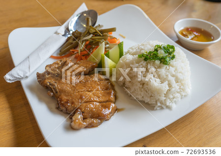 Vietnam gastronomy- pork chop broken rice served Vietnam gastronomy- pork chop broken rice served 72693536