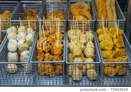 Tasty fried fish ball skewers at Hong Kong food stall Tasty fried fish ball skewers at Hong Kong food stall 72693639