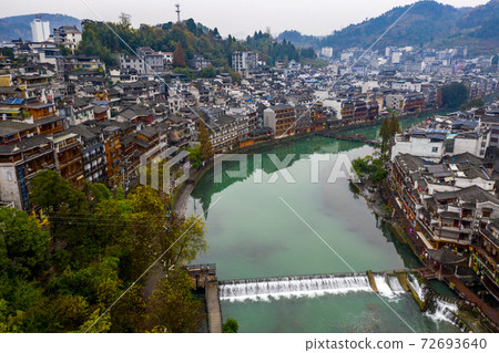 Peaceful aerial view of Fenghuang ancient town in China Peaceful aerial view of Fenghuang ancient town in China 72693640