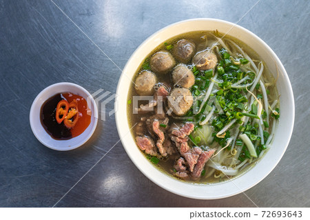 Bowl of delicious beef meat ball Pho noodle soup Bowl of delicious beef meat ball Pho noodle soup 72693643