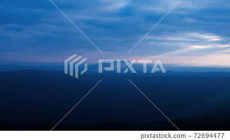 dramatic sunset sunset sky wide and high mountain landscape Pha Yieb Mek in Phu Kradueng National park. Thailand 72694477