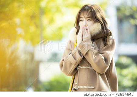 Woman in coat Woman in coat 72694643