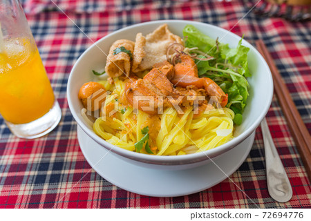 Bowl of delicious Vietnamese mixed rice noodles soup- Mi Quang Bowl of delicious Vietnamese mixed rice noodles soup- Mi Quang 72694776