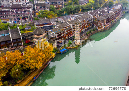 Beautiful aerial angle of Fenghuang ancient town beside TuoJiang river Beautiful aerial angle of Fenghuang ancient town beside TuoJiang river 72694778