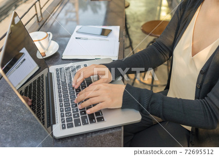 Young woman hand working on laptop - Stock Photo [72695512] - PIXTA