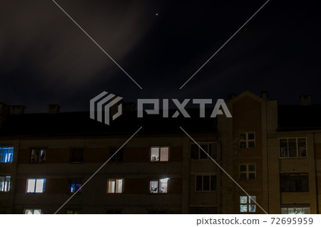 Night sky with stars and clouds, blurred background 72695959
