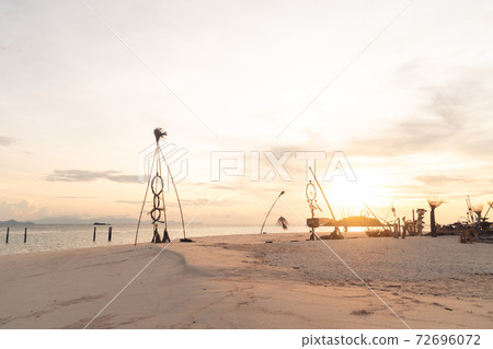 The beach in the morning on Koh Lipe and Long tail boat in the morning The beach in the morning on Koh Lipe and Long tail boat in the morning 72696072