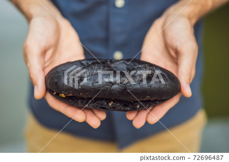 Vietnamese Pork Banh Mi Sandwich in a black baguette 72696487