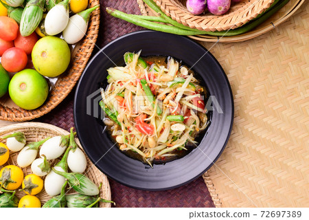 Thai food (Som tum), Spicy green papaya salad Thai food (Som tum), Spicy green papaya salad 72697389