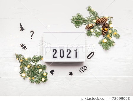 New Year or Christmas layout with numbers 2021. Lightbox with symbols the year 72699068
