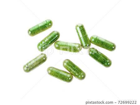 Moringa powder on white background Moringa powder on white background 72699222